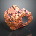 Natural Copper Colored Stone Exhibiting Irregular Shape Black Veins And Textured Surface