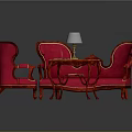 Ornate Red Sofa And Coffee Table Set With Armchair Table Lamp And Decorative Details