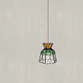 Artistic Pendant Light With Green Yellow Stained Glass Shade And Metal Frame Design