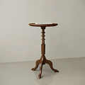 Wooden Side Table With Round Top Decorative Pedestal And Three Curved Legs