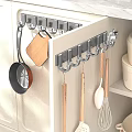 Cabinet Door Kitchen Hooks With Hanging Pans Cutting Board And Utensils in Modern Kitchen