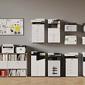 Workplace Office Equipment Display Featuring White Machines Filing Cabinets and Notice Board