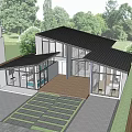 Modern Detached House With Large Glass Windows And Wooden Deck Surrounded By Green Trees