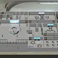 Aerial View Of Modern Interior Layout With Circular Area Desks Green Plants And Digital Screens