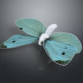 Turquoise Butterfly With Black Spots On Wings And White Fluffy Body Flying On Dark Background