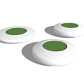 Modern Circular Tree Planters With Green Tops And White Bases For Urban Seating Space