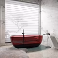Red Bathtub in Modern Bathroom with Window Blinds and Marble Walls and Side Table