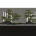 Unique Shaped Trees in Square Black Planters Against Gray Wall With White Pebbles Green Plants