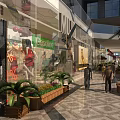 Vibrant Commercial Street with Pedestrians Storefront Displays Green Plants and Modern Buildings