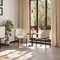 Modern Single Chairs In Bright Living Room With Window Curtains Small Table And Flowers