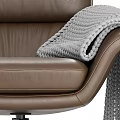 Brown Leather Office Chair With Gray Knitted Blanket Modern Design And Matching Ottoman