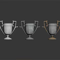 Three Elegant Trophies with Silver Gold Handles Engraved Details and Reflective Bases on Black Surface