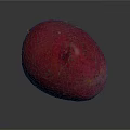 Vibrant Red Potato With Smooth Skin And Oval Shape On Dark Background