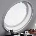Modern Living Room With Circular Window White Walls Brown Sofa Black Chair And Blue Painting