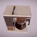 Vintage Style Coffee Maker Kitchen Appliance With Beige And Brown Design And Transparent Glass Carafe