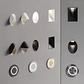 Modern Wall Lamps With Geometric Shapes In Black White And Metallic Tones On Gray Wall