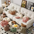 Colorful Pumpkin and Flower Shaped Pillows on White Sofa in Cozy Living Room