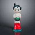 Cartoon Character Figurine With Black Hair Blue Eyes Red Boots And Green Base