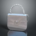 Stylish Silver Handbag With Braided Handle And Front Emblem For Daily Use
