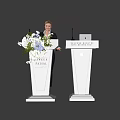 Two White Podiums With Flower Arrangement Microphone And Welcome Speech Sign