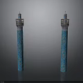 Two Blue Decorative Columns With Intricate Patterns And Ornamental Tops