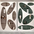 Modern Bookcase With Oval Cutouts White Green Open Shelves Displaying Books Vases And Decorative Items