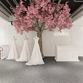 Elegant Bridal Shop Interior With Wedding Dresses White Display Stands Pink Backdrops And Chandelier