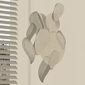 Modern Beige Chandelier With Curved Leaf Shaped Elements Hanging Against Light Colored Wall And Window Blinds