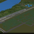 Aerial View Planning of Riverfront Green Fields with Train Station and Blue Storage Tanks