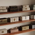 Various Colored Storage Boxes With Different Materials Neatly Arranged On Wooden Shelves