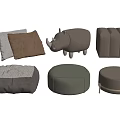 Various Shapes of Ottoman Stools in Neutral Tones with Textured Fabric and Pillows
