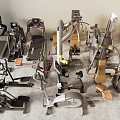 Various Types of Fitness Equipment Including Treadmills Ellipticals and Strength Machines