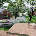 Serene Garden Landscape With Wooden Deck Outdoor Seating Trees And Lush Plants