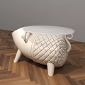 Pig Shaped White Round Side Table With Diamond Quilted Body On Wooden Floor