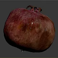 Fresh Ripe Pomegranate With Red Pink Skin And Crown On Dark Background