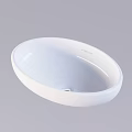 White Oval Shaped Ceramic Wash Basin with Smooth Surface and Modern Design for Bathroom