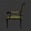 Elegant Classic Armchair With Carved Wooden Frame And Green Upholstery