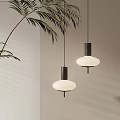 Two Modern Pendant Lights With White Shades Black Bases On Neutral Wall With Leafy Plant