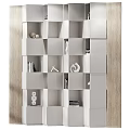 Modern White Bookcase with Geometric Compartments Holding Books Decorative Items and Lamp