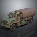 Military Truck With Camouflage Paint And Canvas Covered Cargo Area