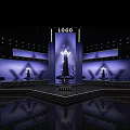 Elegant Stage Design With Purple Backdrop Large Screens And Illuminated Logo