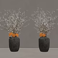 Two Dark Textured Vases With White Floral Branches And Orange Accents