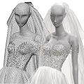Three Elegant Mannequins Showcasing White Wedding Gowns With Veils And Flowing Skirts