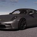 Sleek Gray Sports Car With Black Wheels And Sporty Rear Spoiler Design