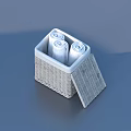Practical Wicker Storage Basket With Open Lid Holding White Household Rolls