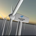 Offshore Wind Turbines with Rotating Blades on Calm Water Surface at Sunset