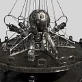 Industrial Equipment Featuring Circular Base And Central Spherical Metallic Structure