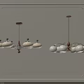 Two Stylish Chandeliers With Wooden Accents Metal Frames And White Dome Shades On Ornate Wall