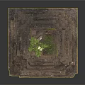 Small Ancient Stone Structure With Mossy Plants On Steps And Arched Doorway