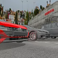 Red Volkswagen Sedan And Gray SUV Parked On Urban Road With Buildings